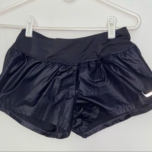 NIKE metallic crew running shorts
